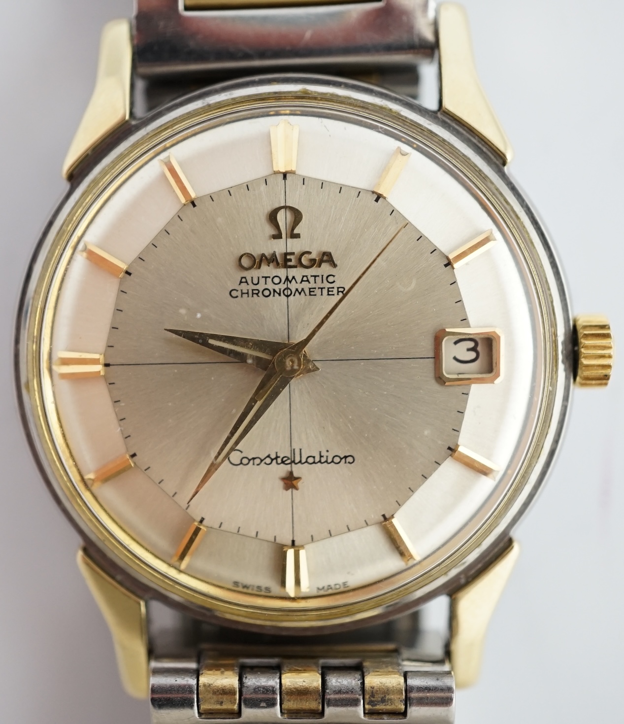 A gentleman's early 1960's steel and gold Omega Constellation automatic wrist watch